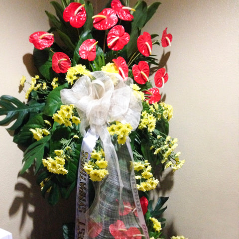 Yellow mums with red anthuriums inauguration