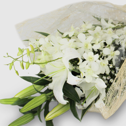 ALL WHITE MORCHIDS AND LILIESIN A BOUQUET