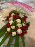 Dozen of white roses with red alstroemerias