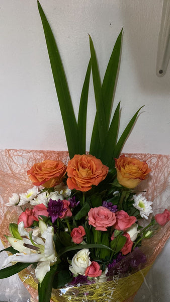 3 imported orange roses with pomelo roses and Lily