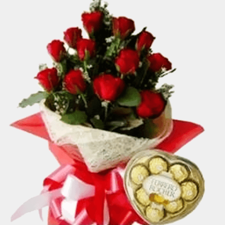 Bouquet of twelve red roses with chocolate