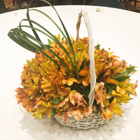Alstroemeria in a basket (gold and white)