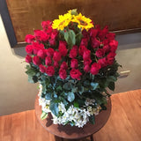 Basket of 3 Sunflowers and 48 pcs of red roses with alstroemeria
