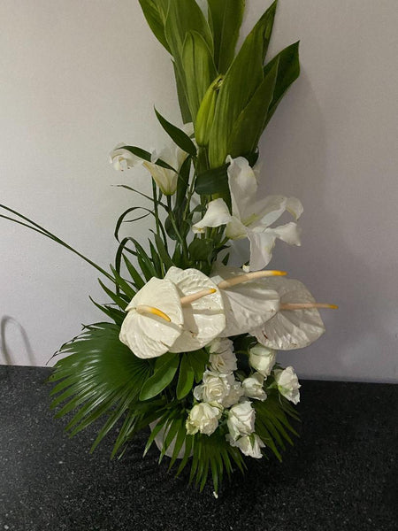 White anthuriums and Roses